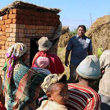 Image of people gathered around a new latrine in Benin