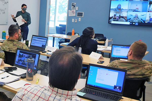 Image of health workers getting COVID training