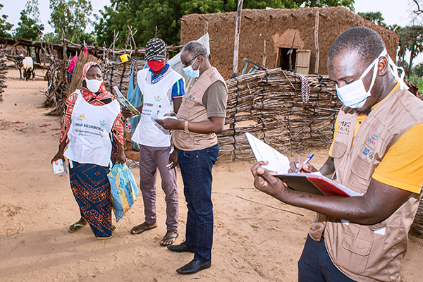 PMI workers in Niger working on malaria prevention