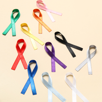 Photo of different colored ribbons associated with different cancer awarenesses.